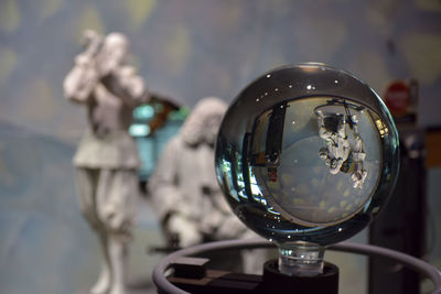 Close-up of water drops on crystal ball