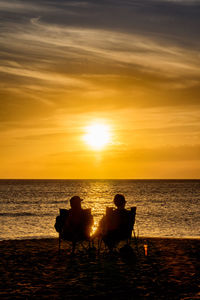 Scenic view of sea at sunset