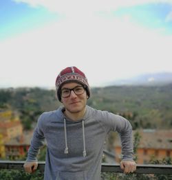 Portrait of mature man standing outdoors