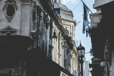 Low angle view of houses against sky