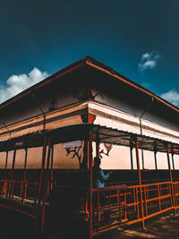 Low angle view of illuminated building against sky