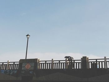 Low angle view of street light against clear sky