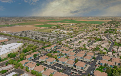 Aerial view of agricultural field against sky