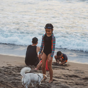 Full length of boys on beach