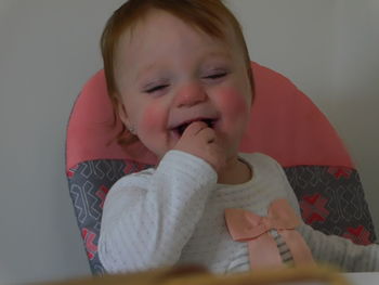 Close-up of cute baby at home