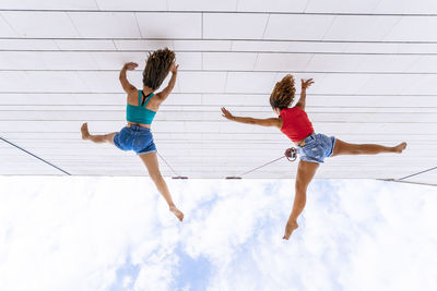 Dancers dancing on window