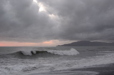 Scenic view of sea against sky during sunset