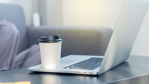 Coffee cup on table at home