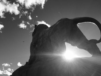 Low angle view of statue against sky