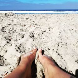 Low section of person on beach