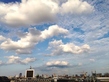 City against cloudy sky