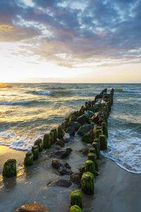 Scenic view of sea against sky during sunset