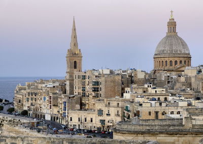 View of cathedral in city against sky