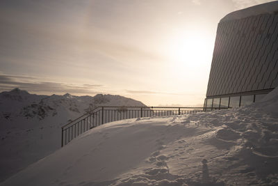 Scenic view of beach against sky during sunset