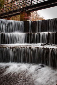 Waterfall at an abandoned mill in north wales greenfield valley heritage park