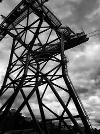 Low angle view of rollercoaster against sky