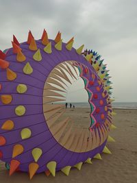 Multi colored umbrella on beach