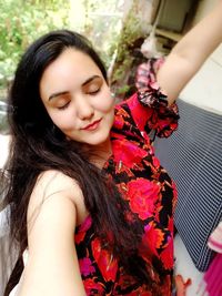 Portrait of smiling young woman