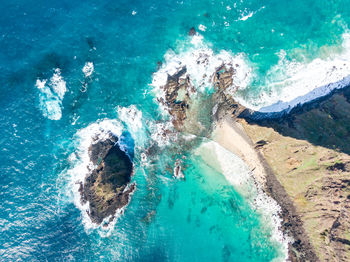 High angle view of people swimming in pool