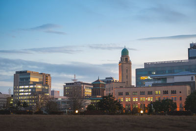 Buildings in city at night