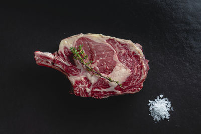 High angle view of strawberry over black background