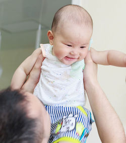 Father holding baby