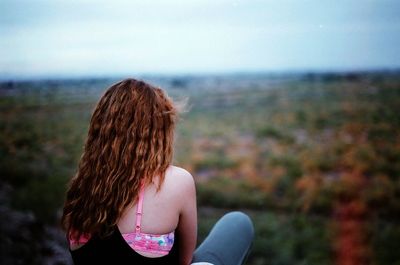 Rear view of woman looking at sea