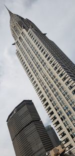 Low angle view of modern building against sky