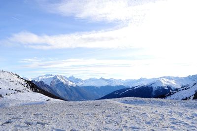 Scenic view of snow covered mountains