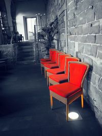 Empty road along built structures