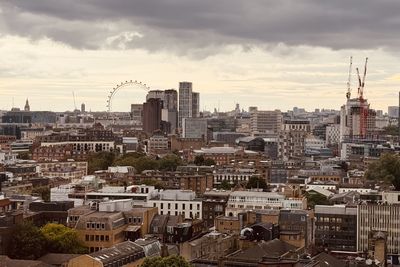 Buildings in city against sky
