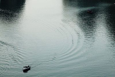 Boats in calm lake