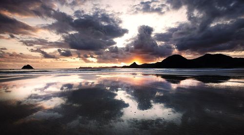 Scenic view of dramatic sky over sea