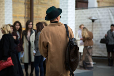 People standing in front of building