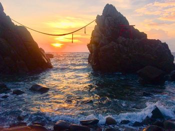 Scenic view of sea against sky during sunset