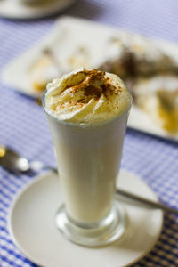 Close-up of coffee cup on table