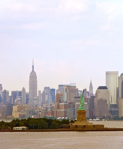 Buildings in city against sky