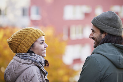 Happy couple in autumn scenery