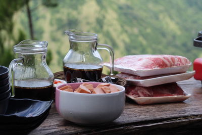 Barbeque cooking ingredients on a wooden table