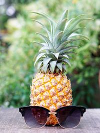 Close-up of sunglasses against clear sky