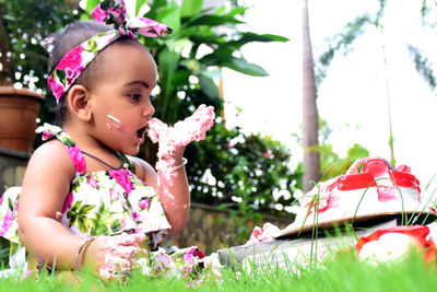 Portrait of girl with pink flowers