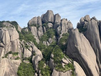 Panoramic view of rocky mountains against sky