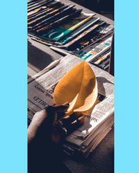 High angle view of man reading book