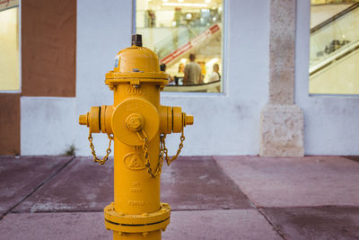 Close-up of fire hydrant in city