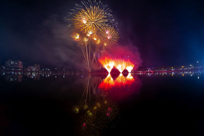 Firework display at night