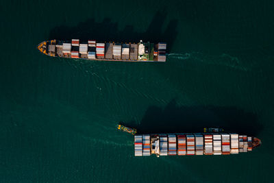 High angle view of container ship in sea