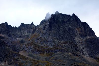 Low angle view of mountains against sky