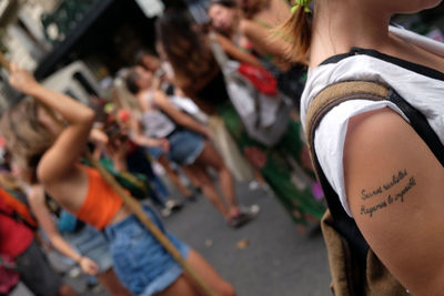 High angle view of woman with text on road