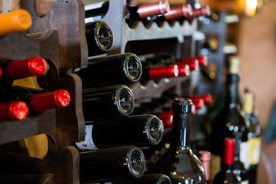 Wine bottles on rack at store