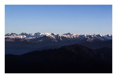 Scenic view of mountains against clear sky